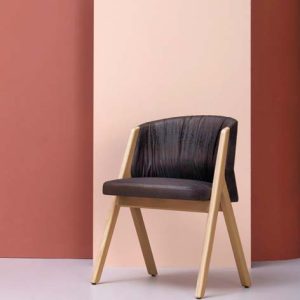 Dizajnerski stol Accento t-bone v premium tkanini